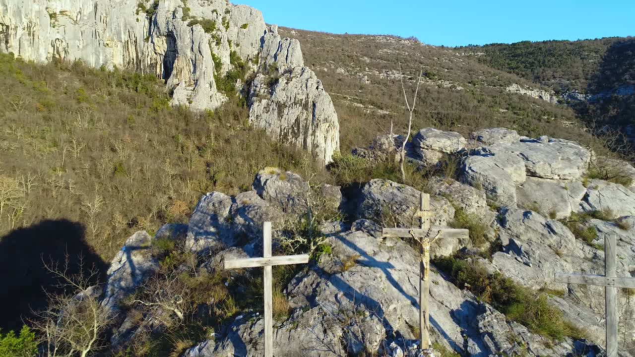 fly over wooden crucifix cross at mountain. Christianity