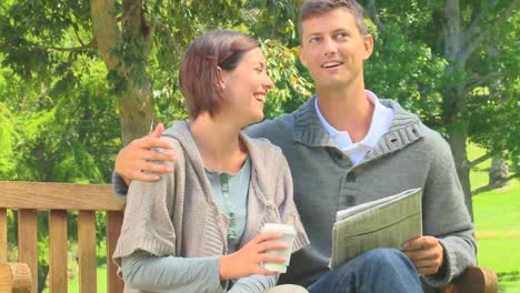 young couple doing crosswords