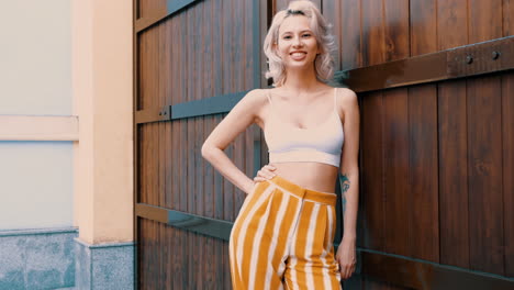 stylish woman in striped pants