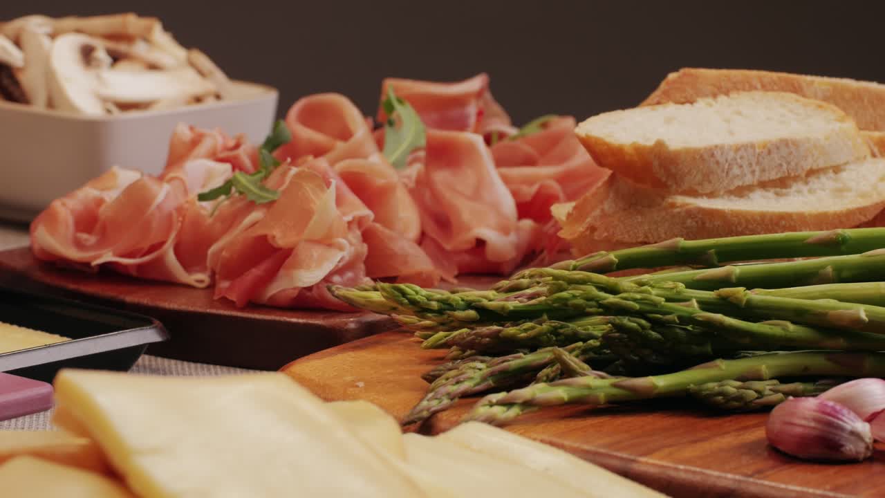 Italian or Spanish restaurant with traditional tapas food, Spanish cuisine, delicious tapas and cheese plate, bruschetta with cheese, olives dry tomatoes and tasty sandwich bar appetizer, buffet