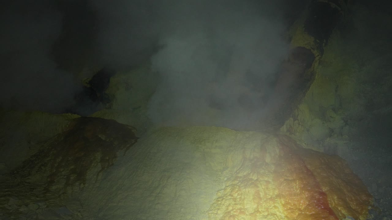 Sulfur plume toxic gas smoke high pressure fire Ijen volcano Indonesia