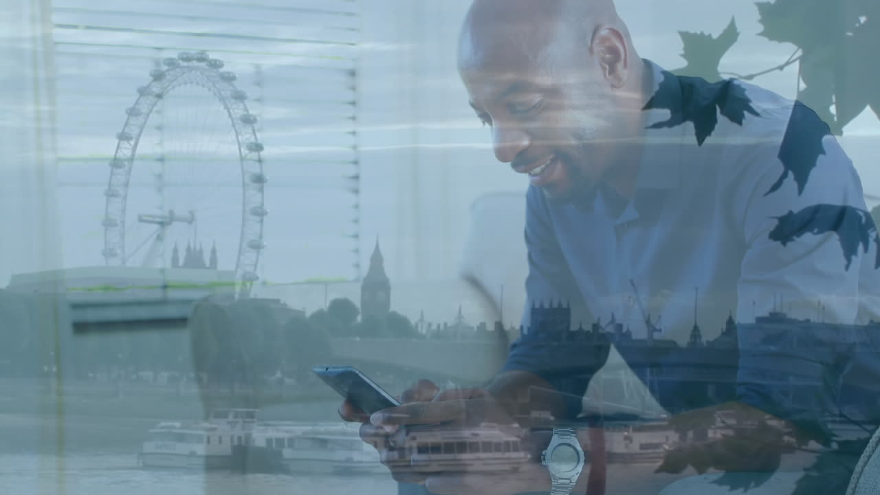 Man using smartphone and cityscape