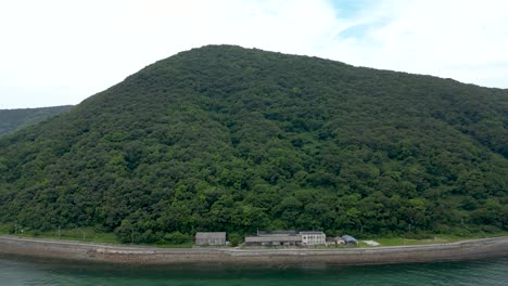 Push out drone flight over Sanagi Cat Island with hostel