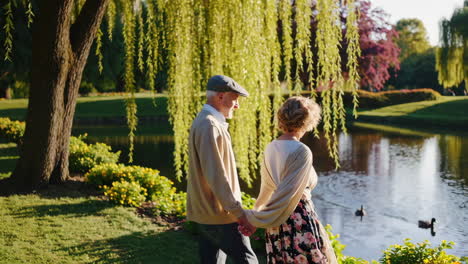 senior couple enjoying a romantic walk in the park