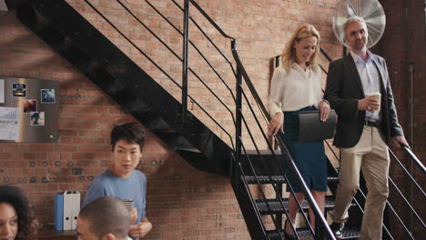 multi ethnic young startup business team working on modern environment