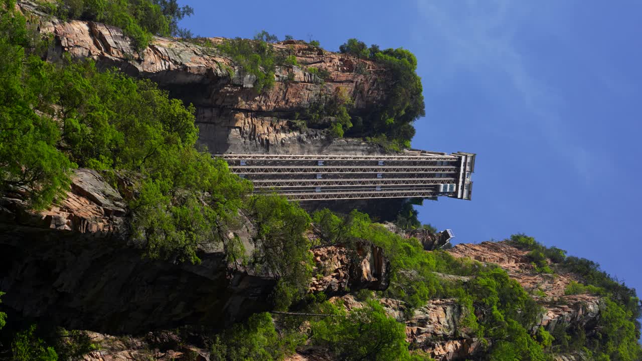 Bailong Elevator structure in the cliff of a sandstone pillar, Zhangjiajie. Vertical