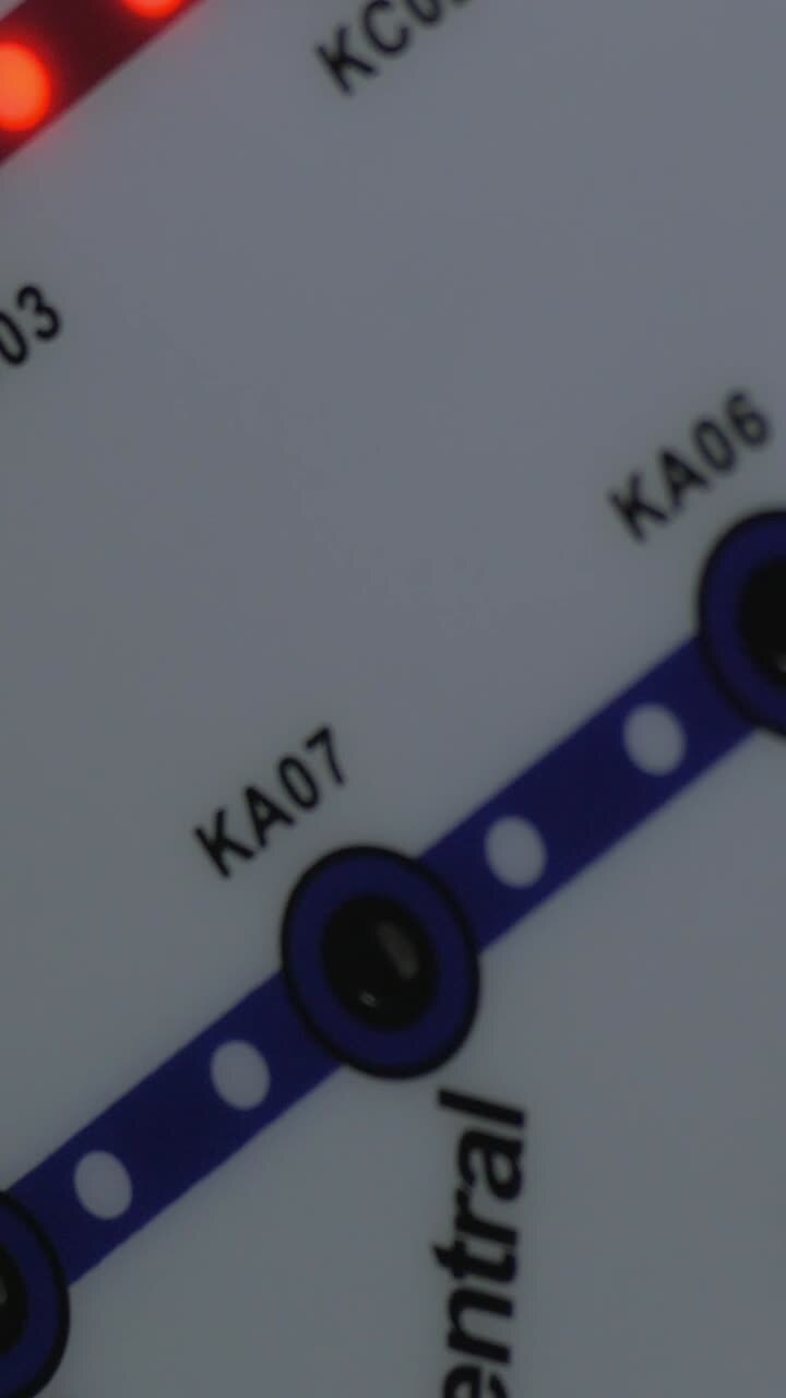Close-up of Train Map Display with Changing Station Lights
