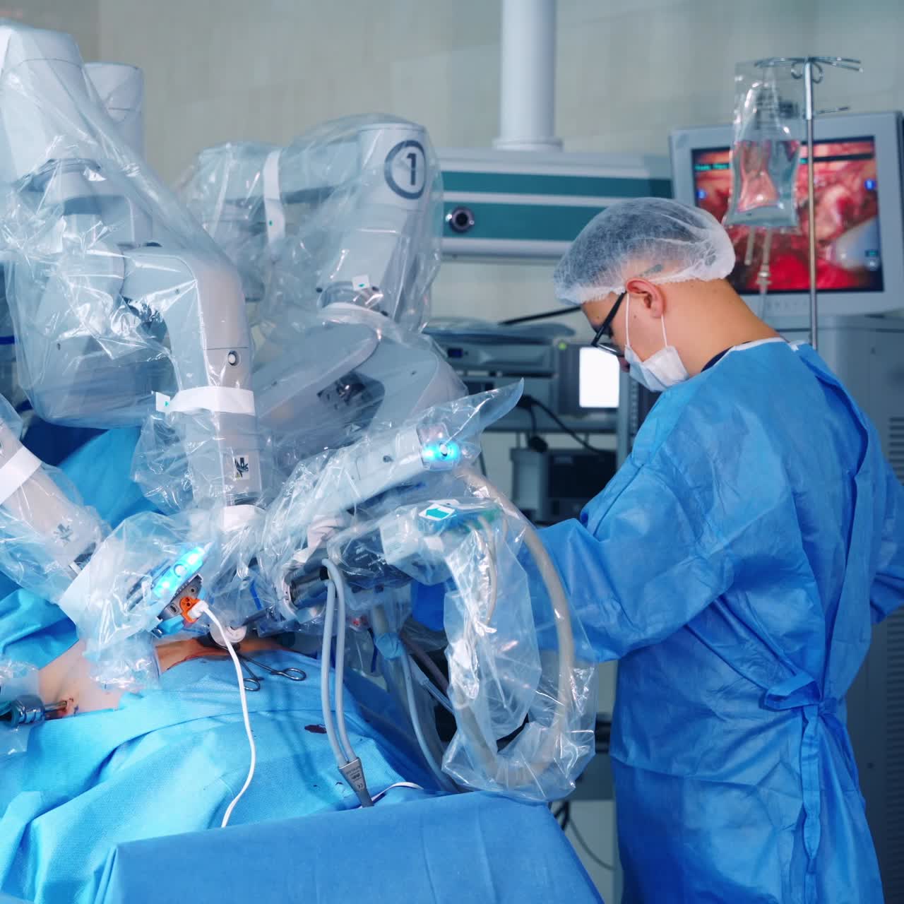 Futuristic surgery in the operating room. Doctor in medical uniform near the modern robotic device in the hospital.