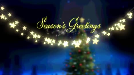 Animation-of-christmas-seasons-greetings-and-glowing-fairy-lights-over-christmas-tree