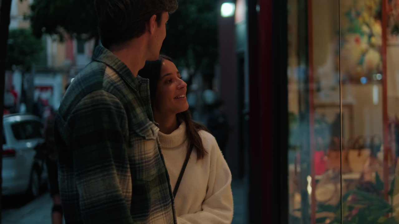 Young Couple Window Shopping in Seville