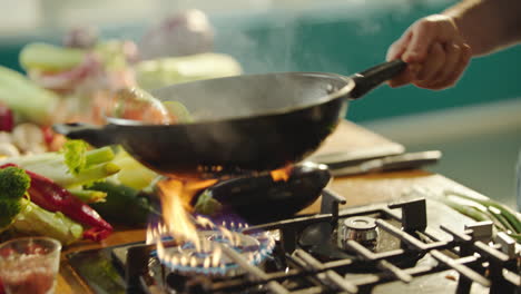 cooking vegetables in a wok