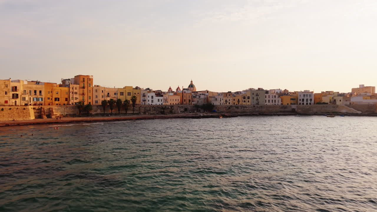 Trapani waterfront in Sicily at sunset, serene and picturesque view