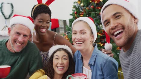 portrait of happy group of diverse friends looking at camera and smiling