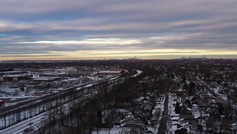 An-aerial-shot-over-a-suburban-neighborhood-at-sunrise