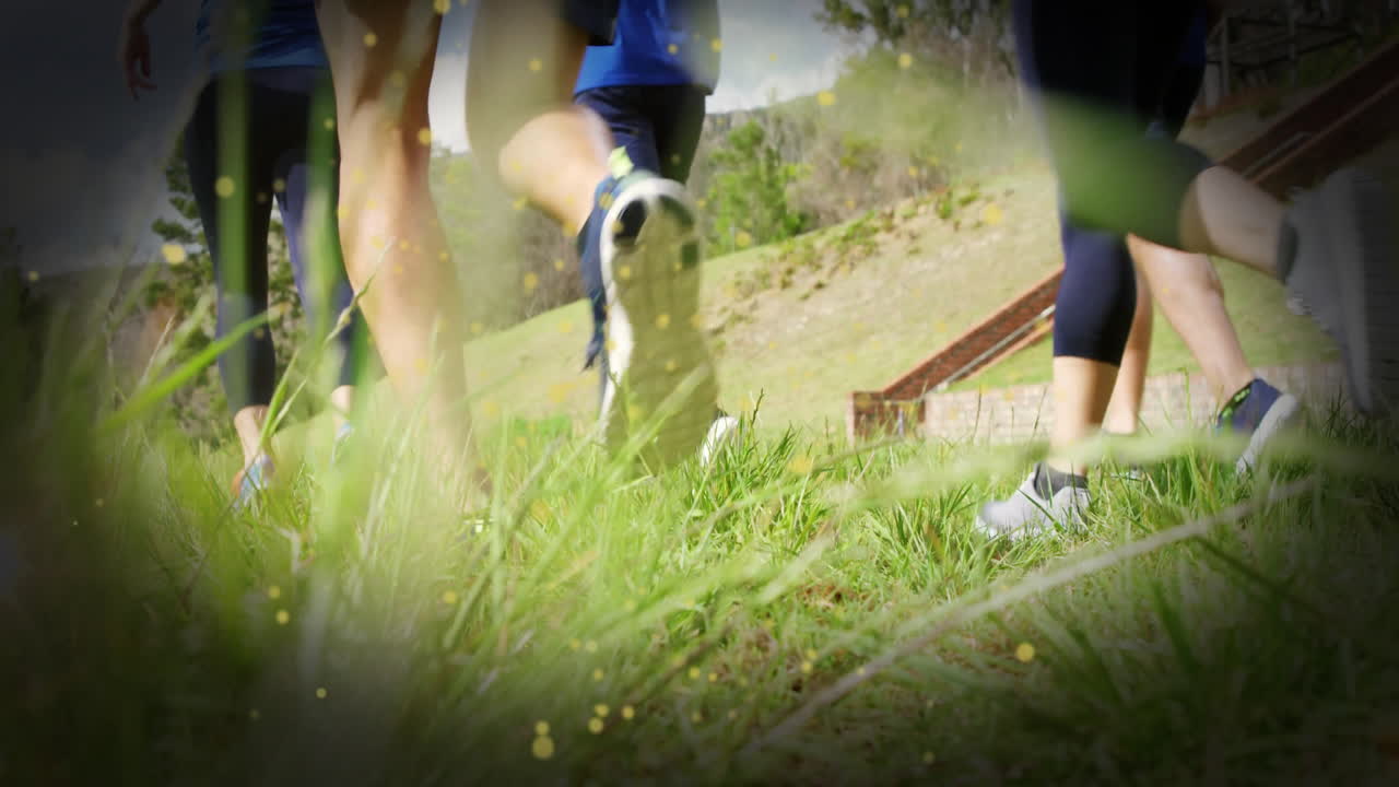 Six runners sprinting uphill through grass, displaying animated health charts and heart icons