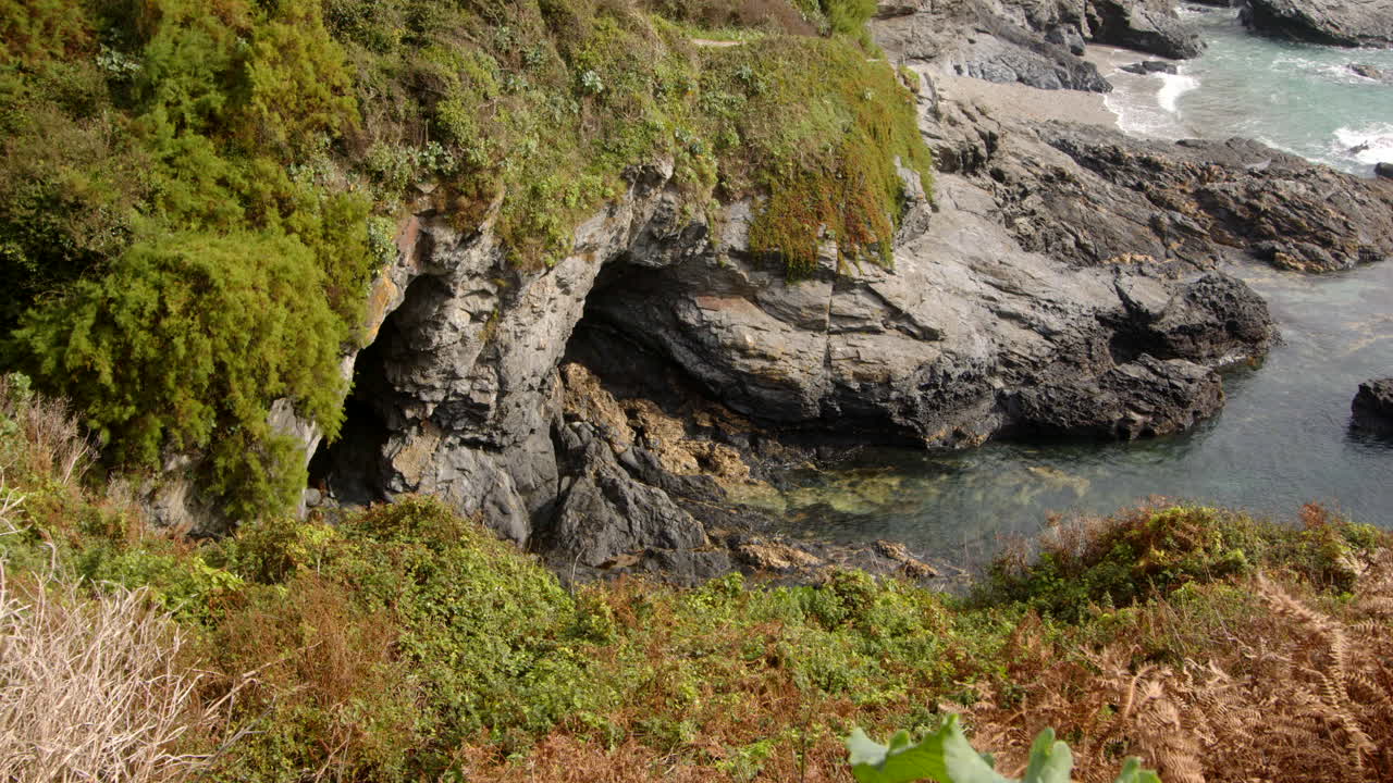 Looking down on to the sea and rocks at Bessy's Cove, The Enys taken from the Coastal path , cornwall