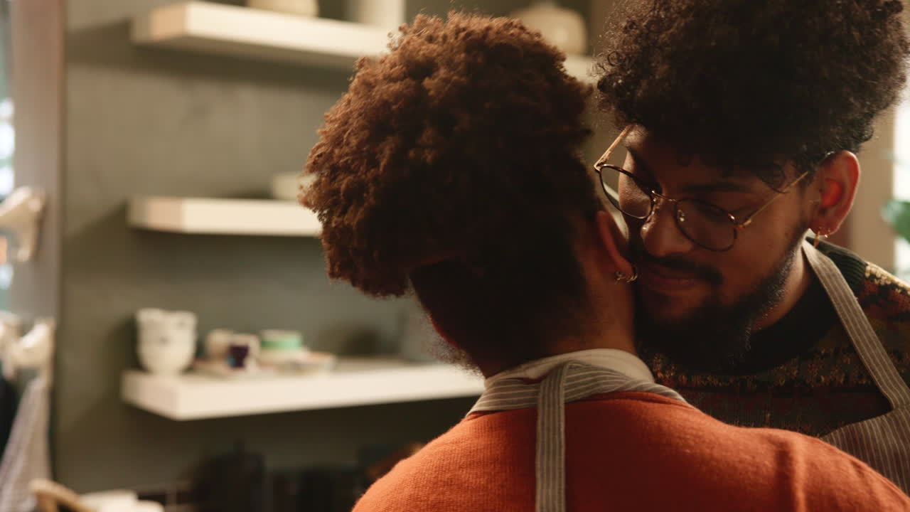 A young couple in love in the kitchen