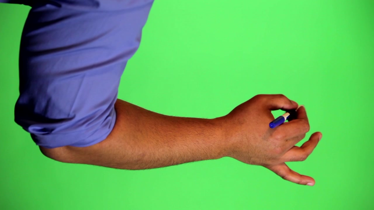 An arm in front of a green screen to be keyed and used at will. Rotate image for best results. Originally used for a few animated whiteboard videos. Blue marker writing with pinky out.
