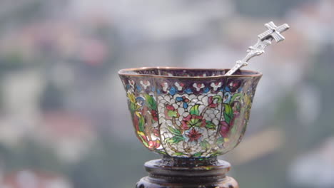 Slow-Motion-Macro-Close-Up-Parallax-Pan-of-Decorative-Stained-Glass-Cup