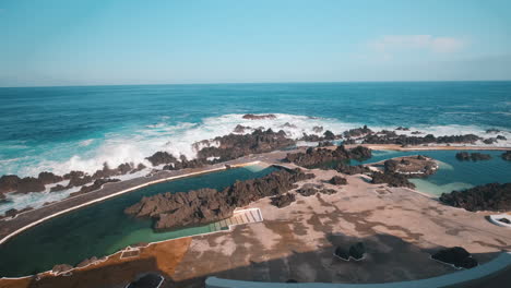 quiet porto moniz natural swimming pools, from balcony in sunny madeira - pov view