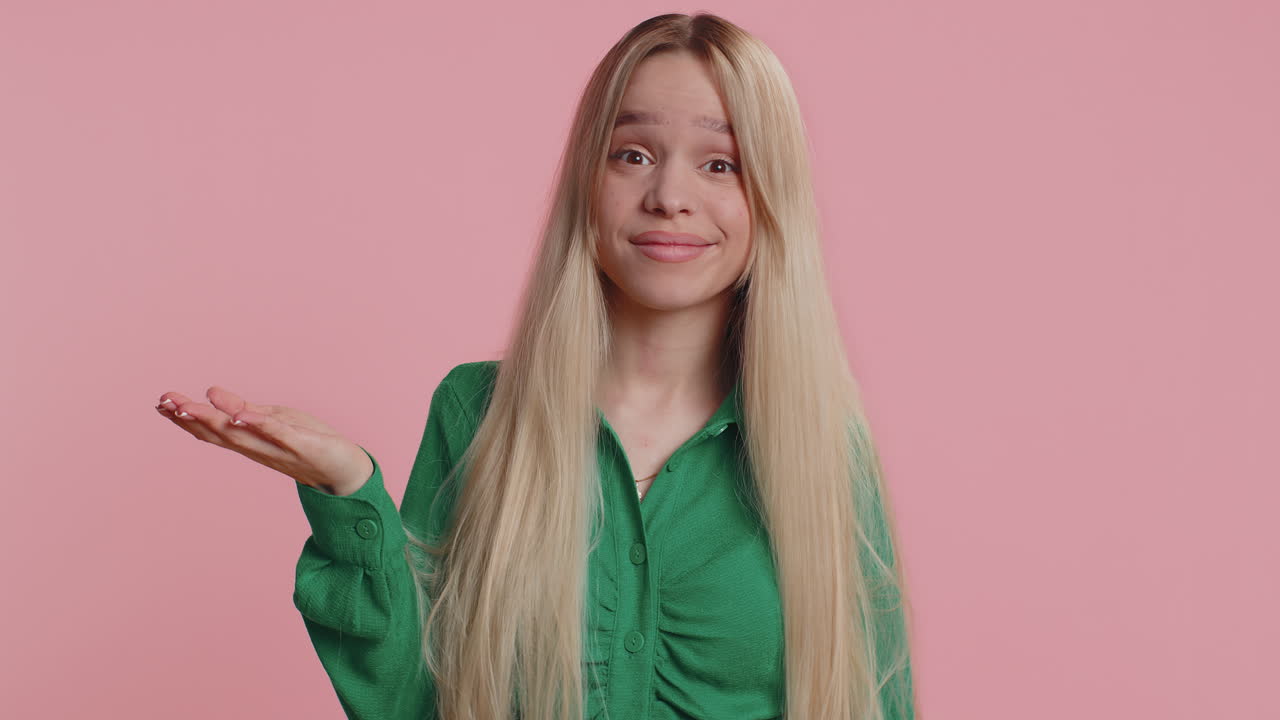 Upset confused young woman making face palm gesture feeling bored disappointed in result bad news