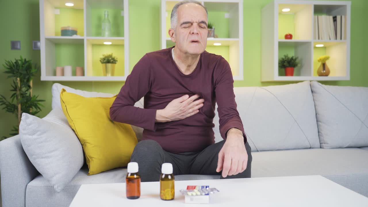 The old man, whose pulse has fallen, is having trouble breathing.