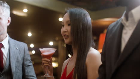 woman playing roulette and drinking.