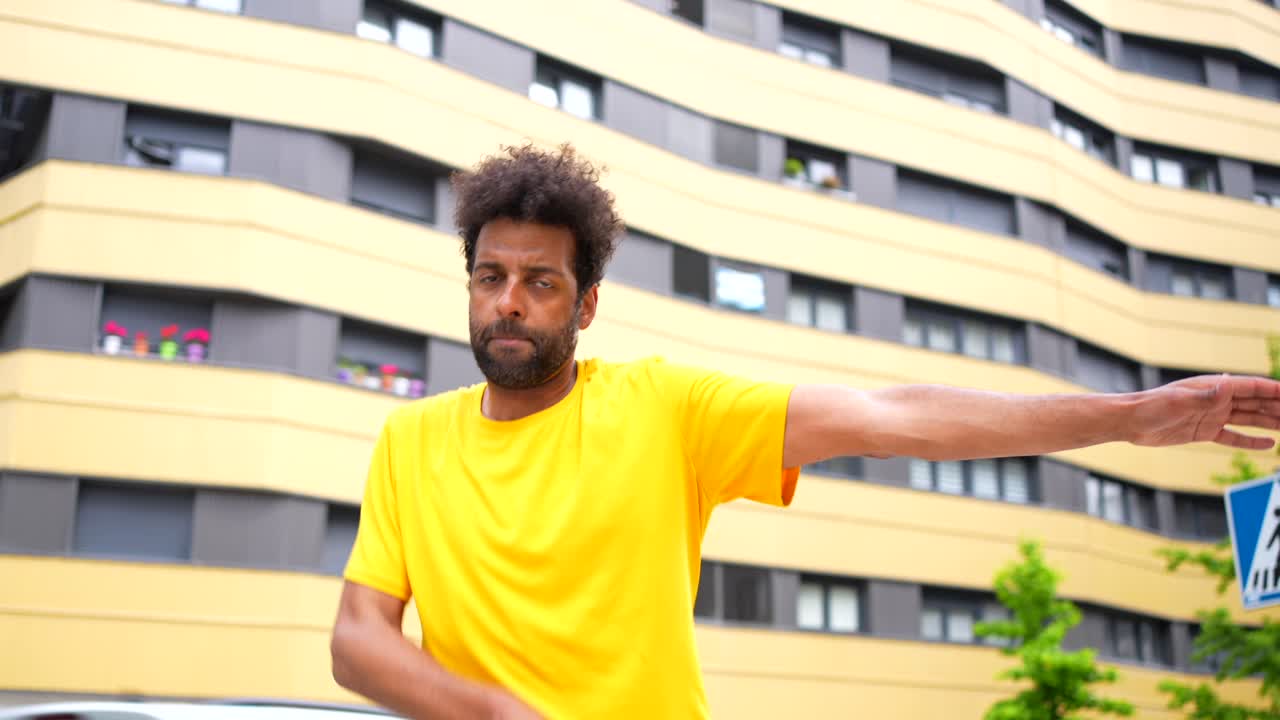 Man dancing in an urban environment