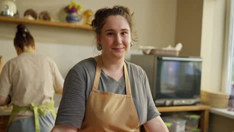 two women baking together in the kitchen