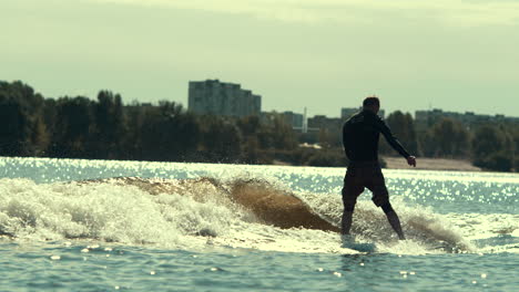 man practicing water boarding