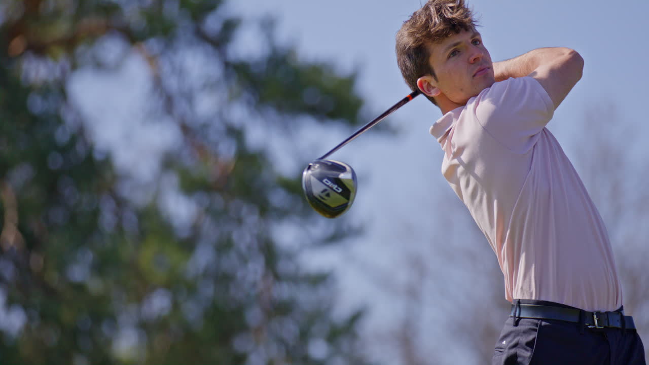 Young golfer playing on a sunny spring day in Switzerland, showcasing precise chipping, putting, bunker, and approach shots. Perfect for sports, lifestyle, and outdoor themes.
