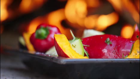 salad with fire burning in selective focus cinemagraph