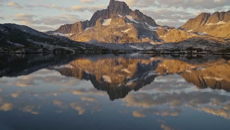 stunning mountain lake reflection at sunrise
