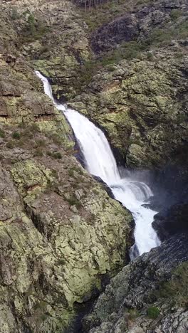 aerial view of river waterfall in the mountains aerial view