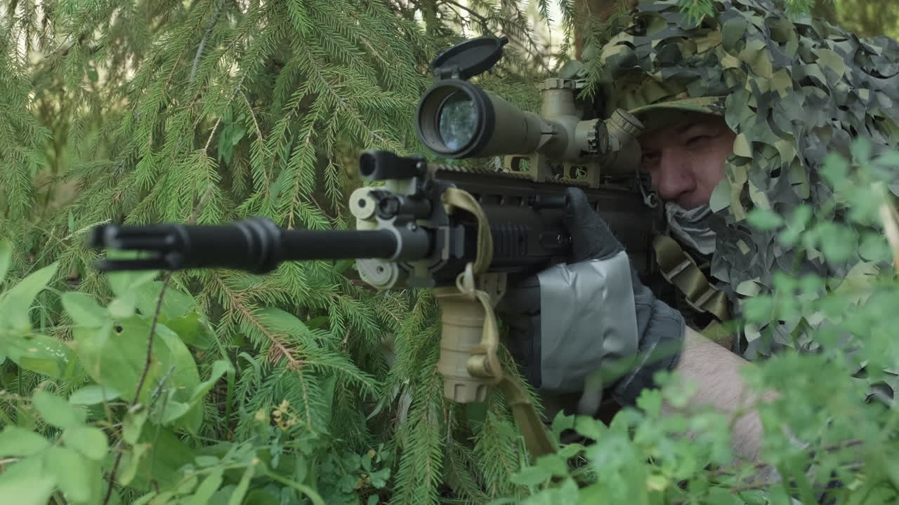 Disguised Man Aiming With Rifle In Shelter