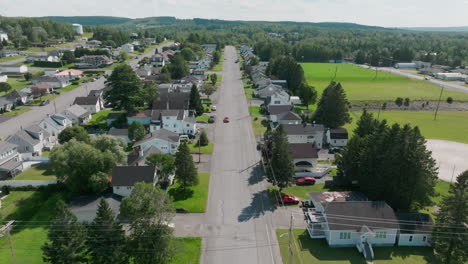 drone moves slowly over madawaska, revealing the tranquility of rural maine