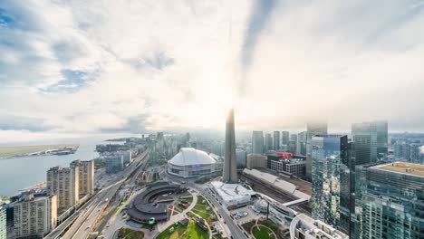 toronto, ontario, canada, zoom out timelapse view of toronto cityscape showing modern buildings in the financial district on a foggy day