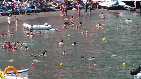 people swimming and relaxing at sorrento beach