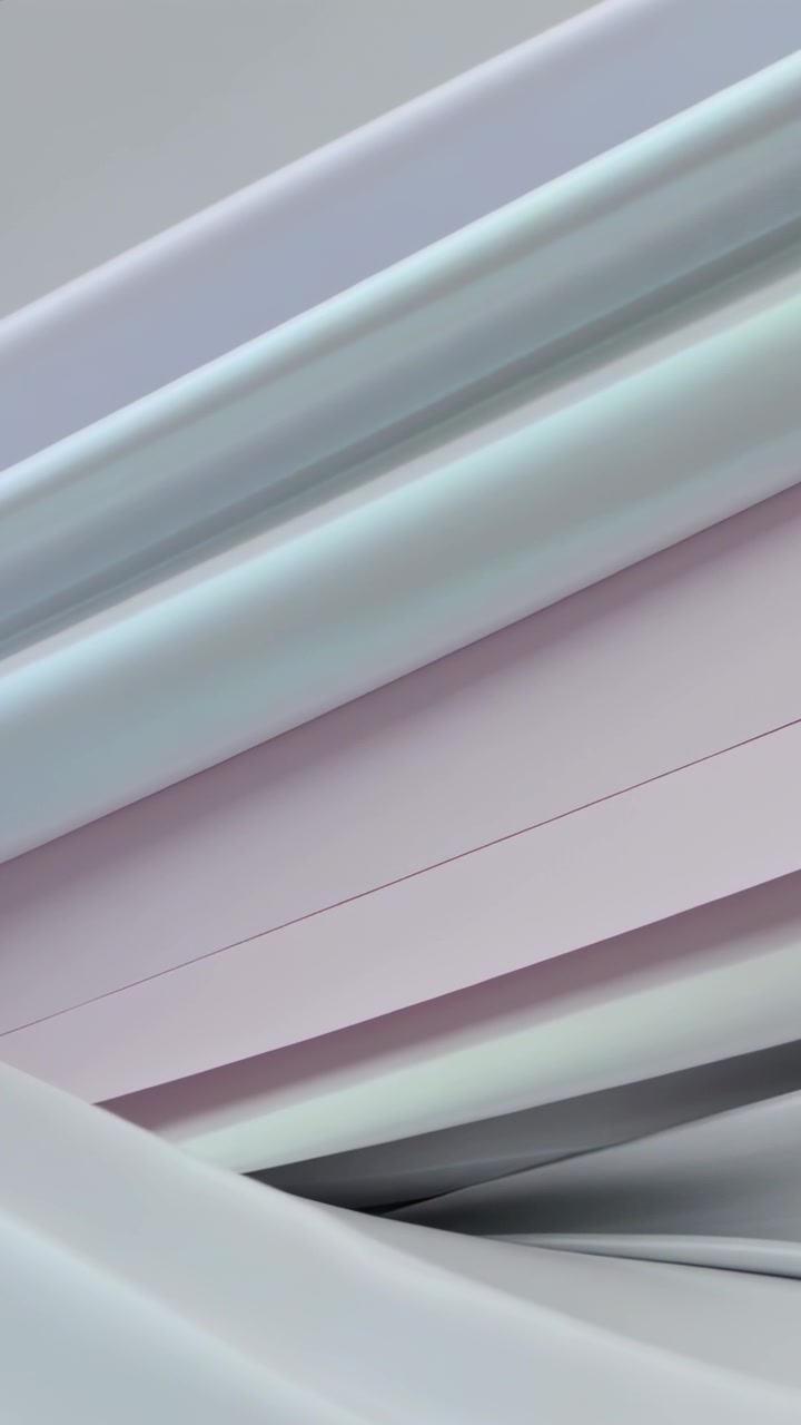 Vertical video: Sliding silky folds shifting from subtle camera pan in studio, revealing pink band