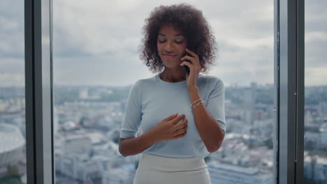 smiling business woman using smartphone