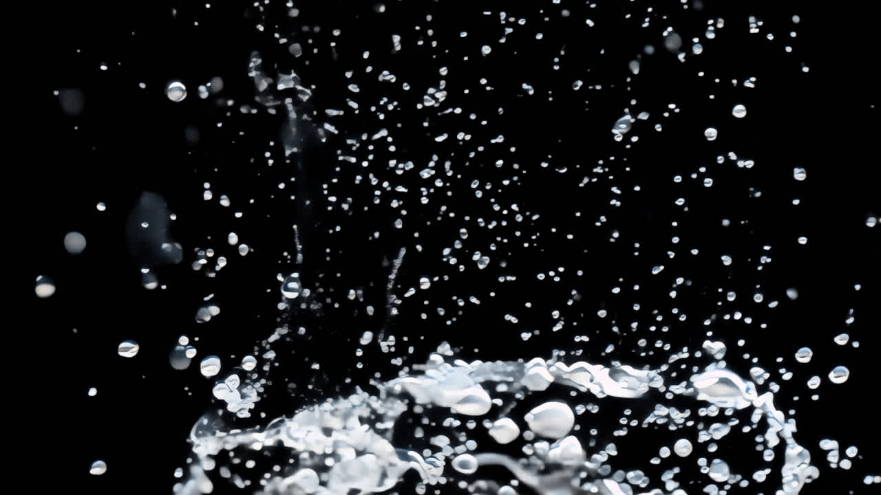 Dynamic water splash droplets captured animated overlay, transparent 4K video, alpha channel, ProRes