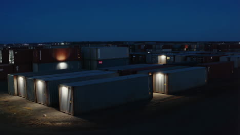 shipping container yard at night