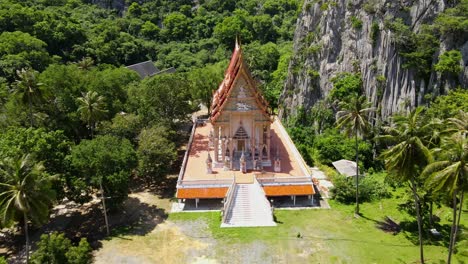 reverse aerial footage from the top of the temple revealing the whole structure and the beautiful landscape