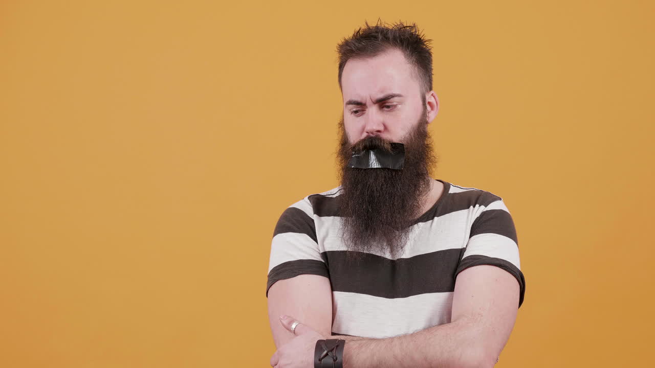 A man with duct tape on his mouth