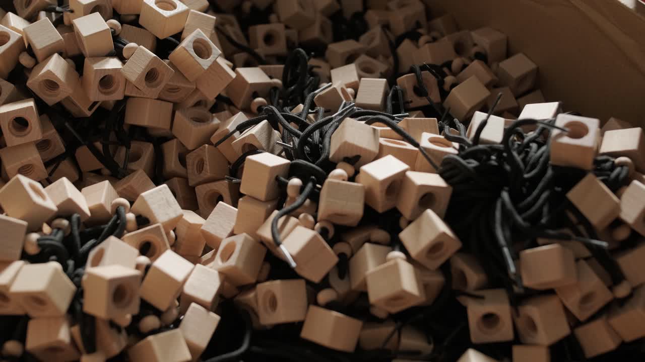 Pile of Wooden Craft Blocks with Strings