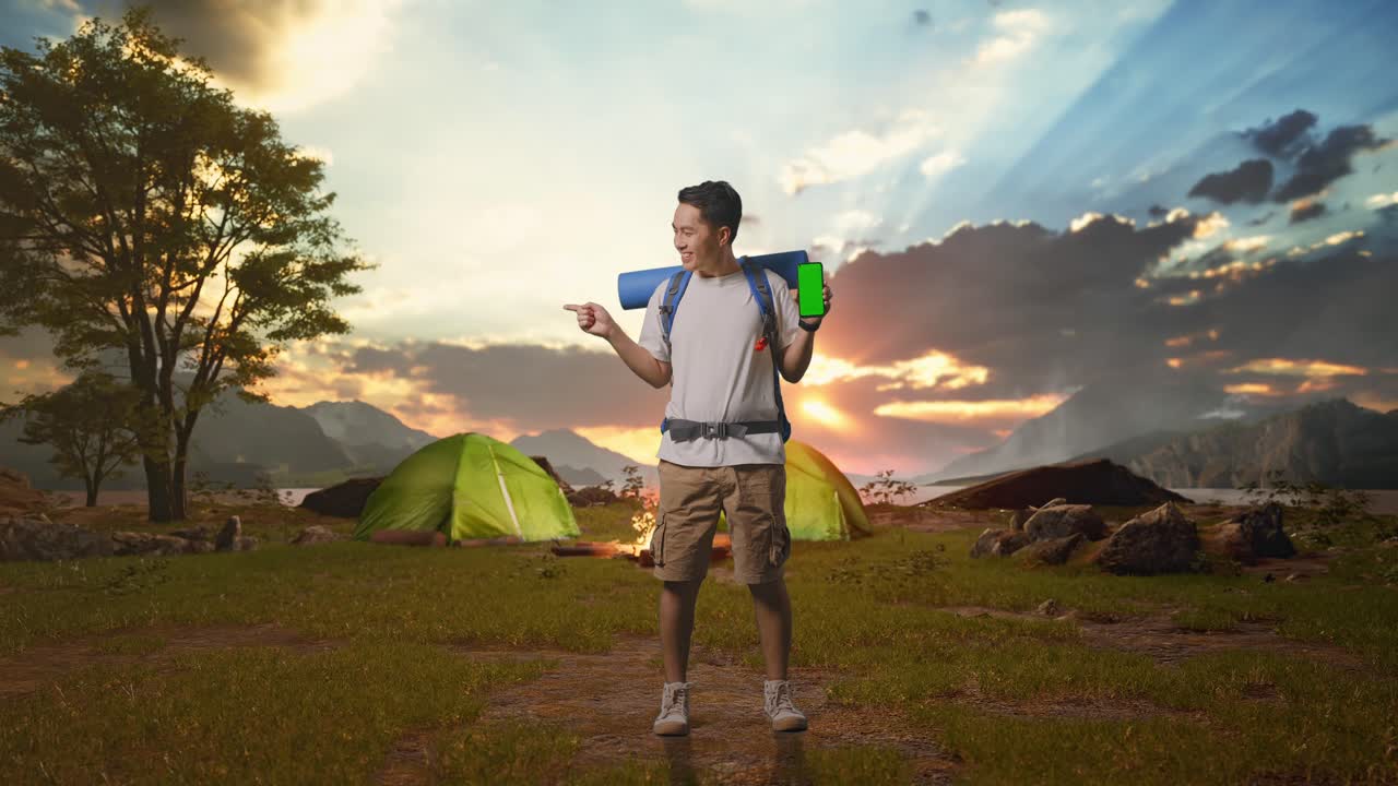 Man Camping with Phone