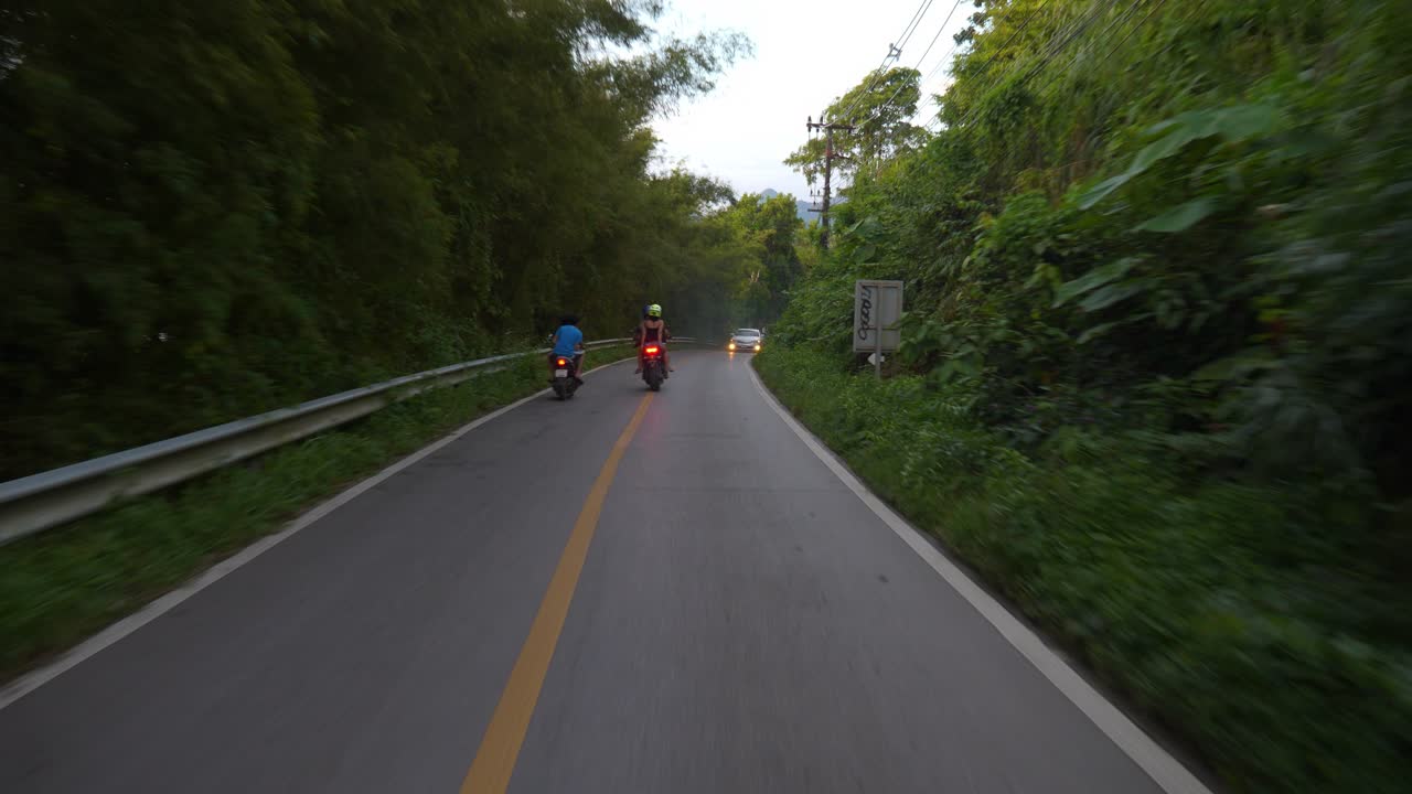 Rear dashcam of a filthy exhaust pipe, leaving behind a smoke trail Slowmo