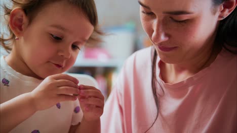 A Heartwarming Moment: A Young Child Engages in Creative Play with a Caring Adult, Fostering Learning and Connection Through Shared Activities