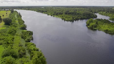 aerial view of wide river in florida that is connected to lake okeechobee