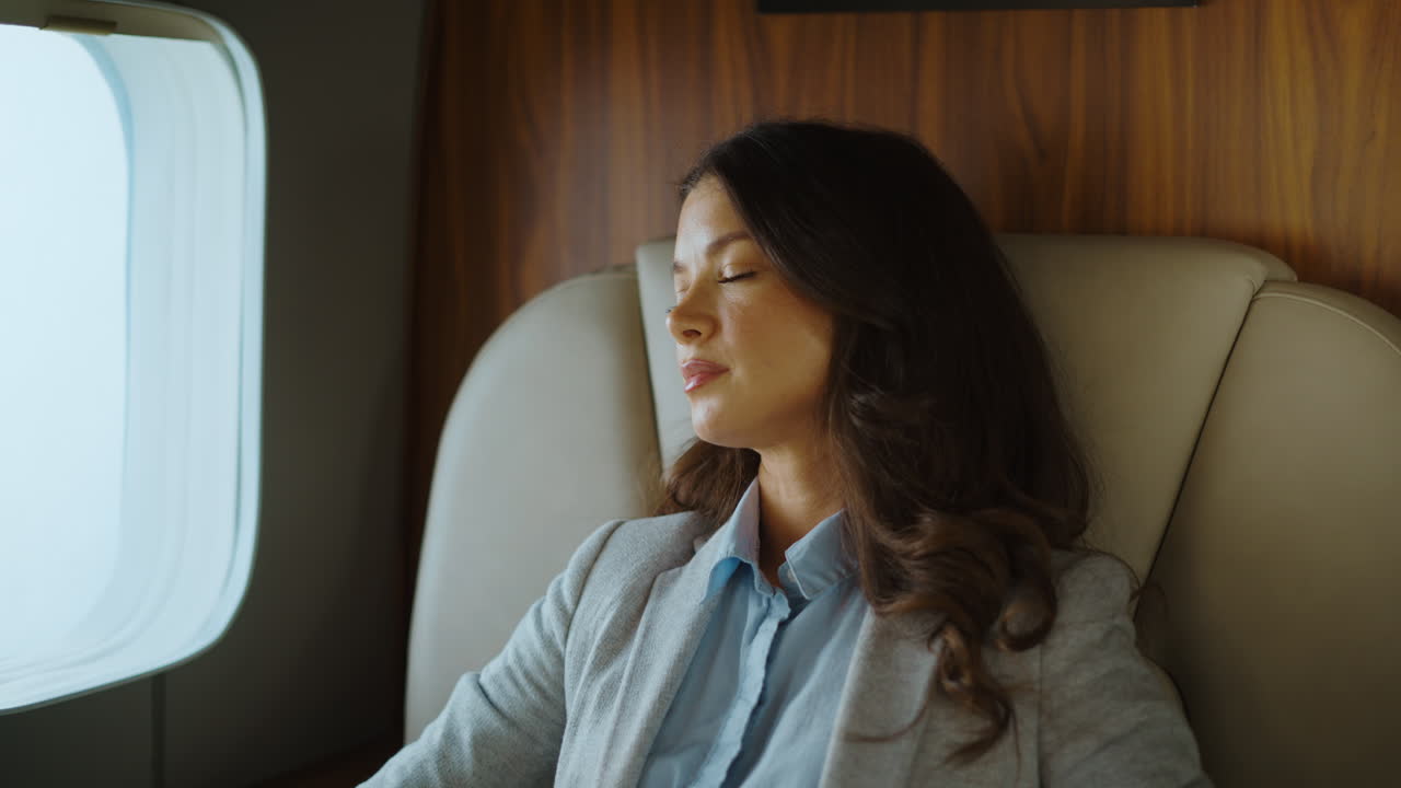 Woman Sleeping on Private Jet